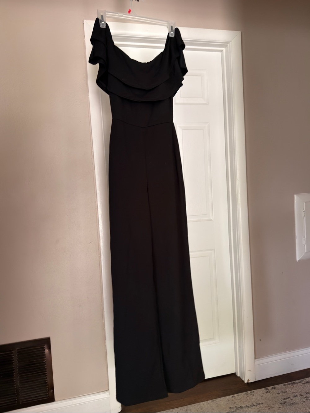 Fashion Nova black off shoulder ruffle wide leg jumpsuit (XS)